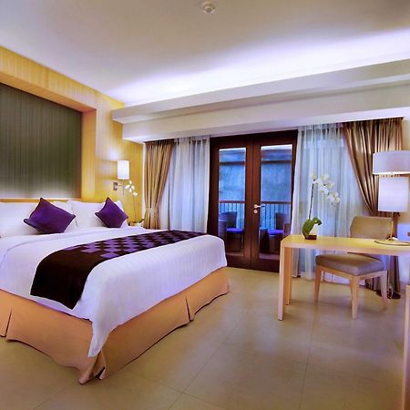 Quest Hotel Kuta By Aston Extérieur photo