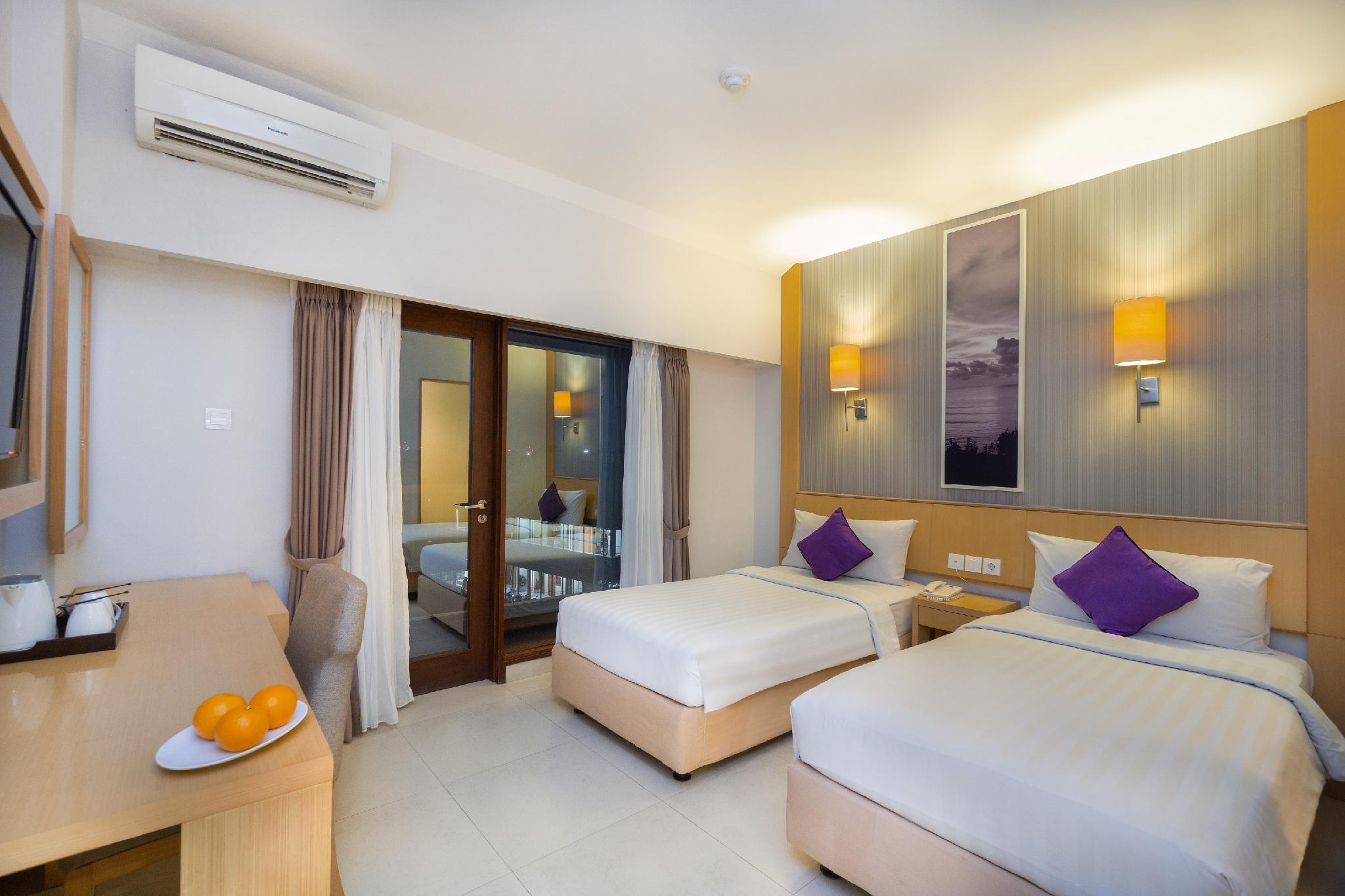 Quest Hotel Kuta By Aston Extérieur photo