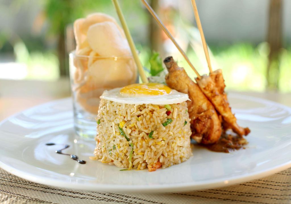 Quest Hotel Kuta By Aston Extérieur photo